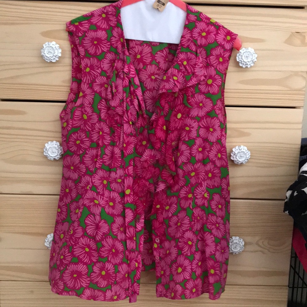 Sleeveless silk top with neck tie and frill